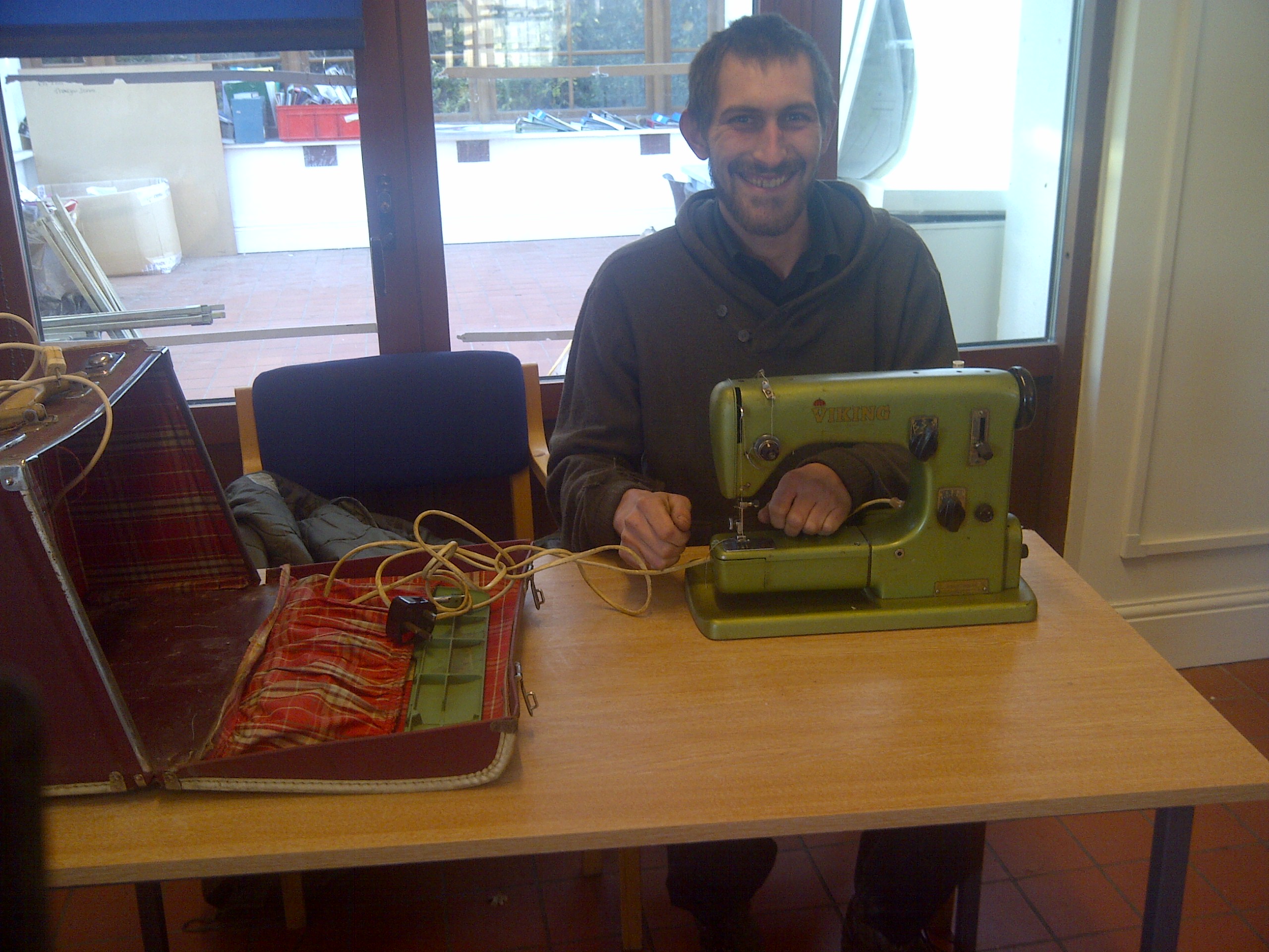 One satisfied customer with his newly working classic sewing machine at a Repair cafe event at Heeley City Farm in 2013